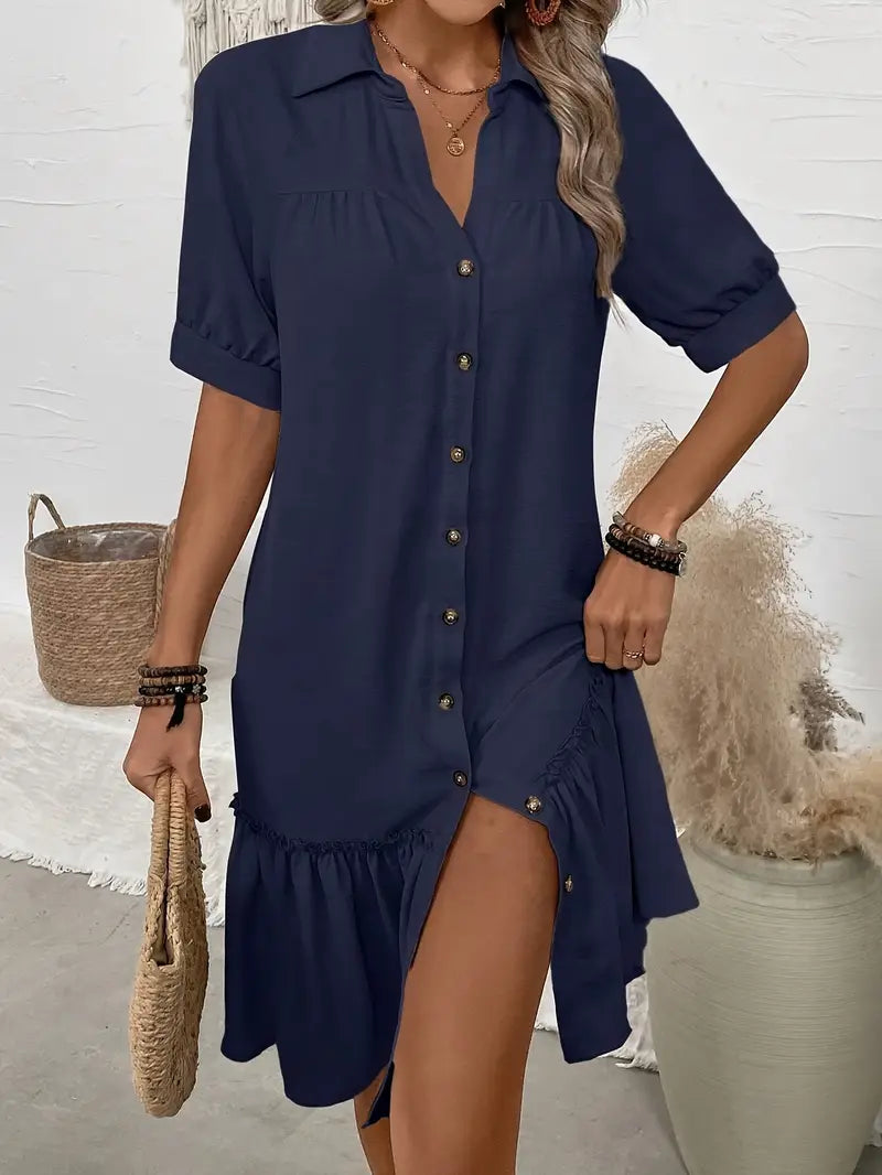 Isla zomerjurk in marineblauw met rucheszoom – vooraanzicht